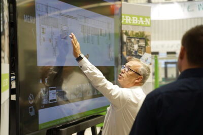 An Urban employee explains a logistics facility